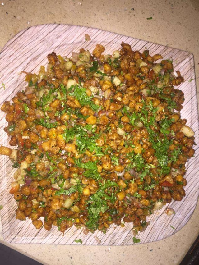 Tasty Corn Chaat cooked by COOX chefs cooks during occasions parties events at home