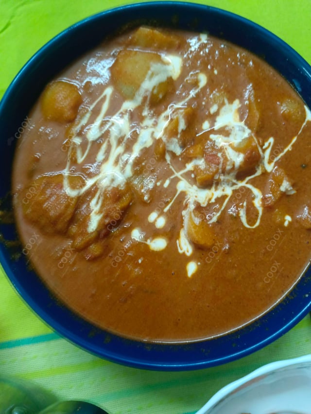 Delicious Dum Aloo prepared by COOX