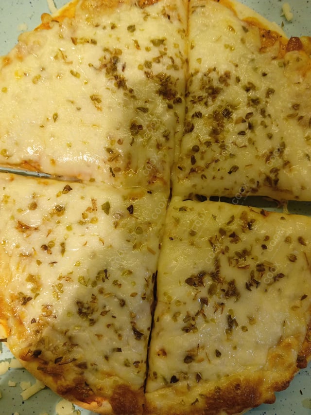 Tasty Margherita Pizza cooked by COOX chefs cooks during occasions parties events at home