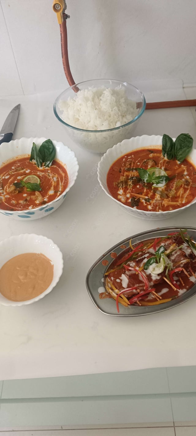 Tasty Red Thai Curry cooked by COOX chefs cooks during occasions parties events at home