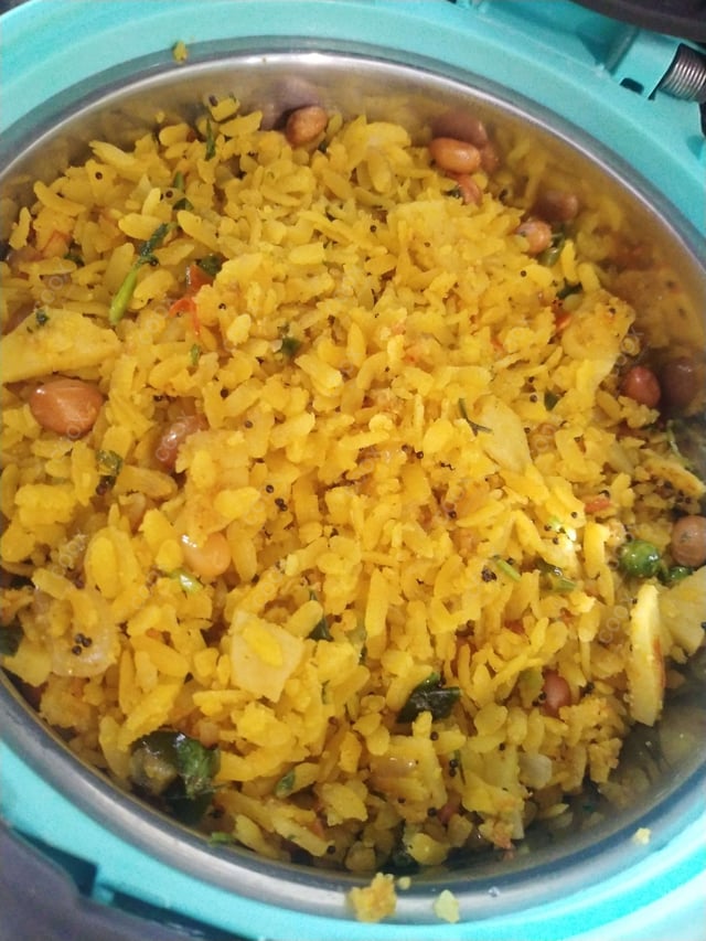 Tasty Poha cooked by COOX chefs cooks during occasions parties events at home