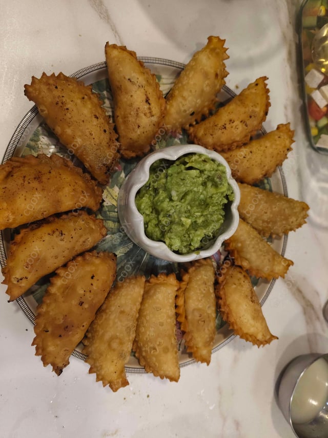 Tasty Veg Empanada cooked by COOX chefs cooks during occasions parties events at home