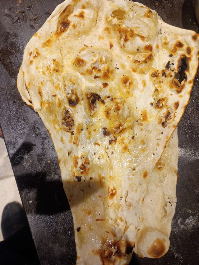 Delicious Naan (Butter / Garlic) prepared by COOX