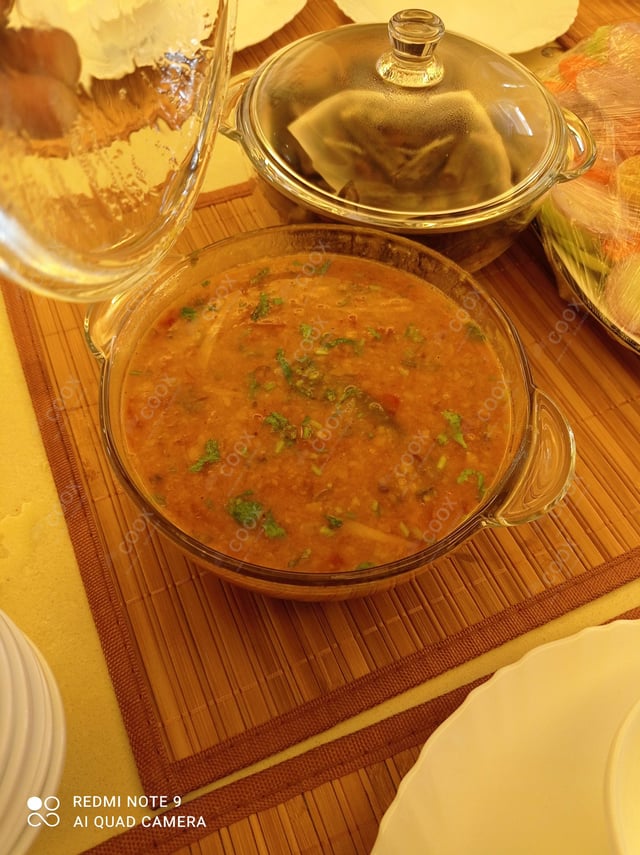 Tasty Dal Tadka cooked by COOX chefs cooks during occasions parties events at home