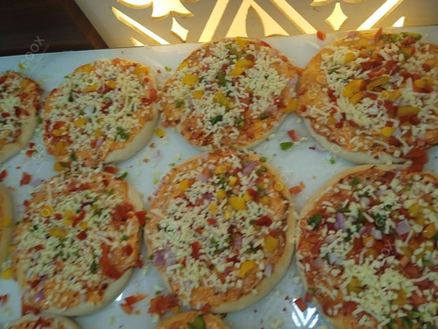 Delicious Margherita Pizza prepared by COOX