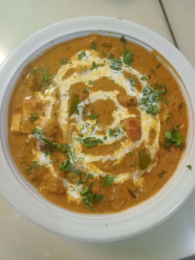 Delicious Kadhai Paneer prepared by COOX