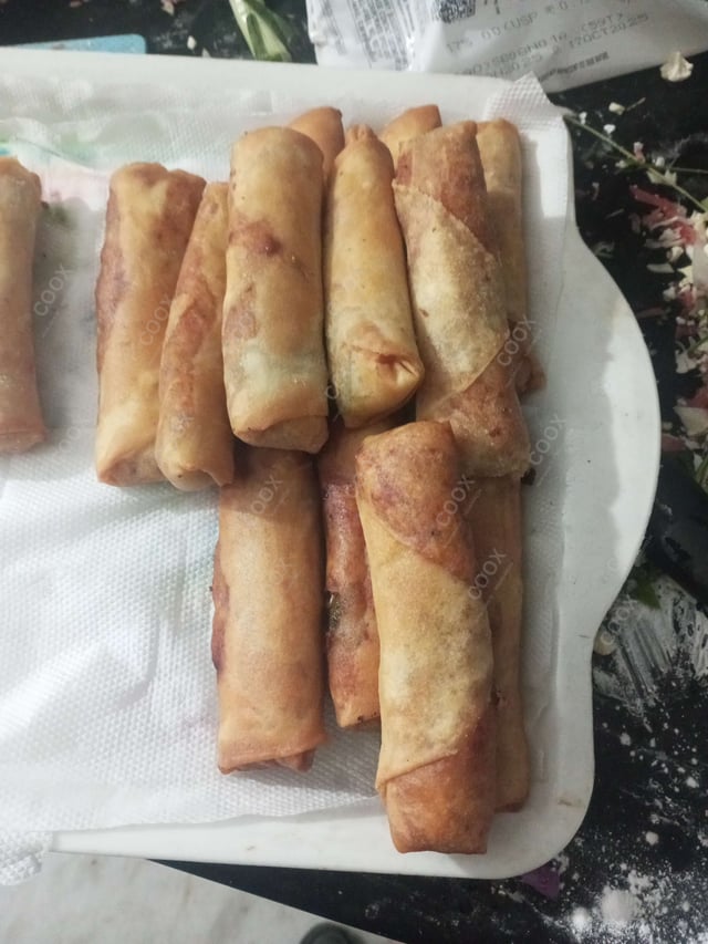 Delicious Veg Spring Rolls prepared by COOX