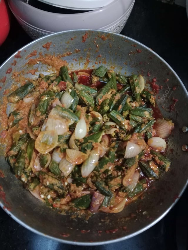 Tasty Bhindi do Pyaza cooked by COOX chefs cooks during occasions parties events at home