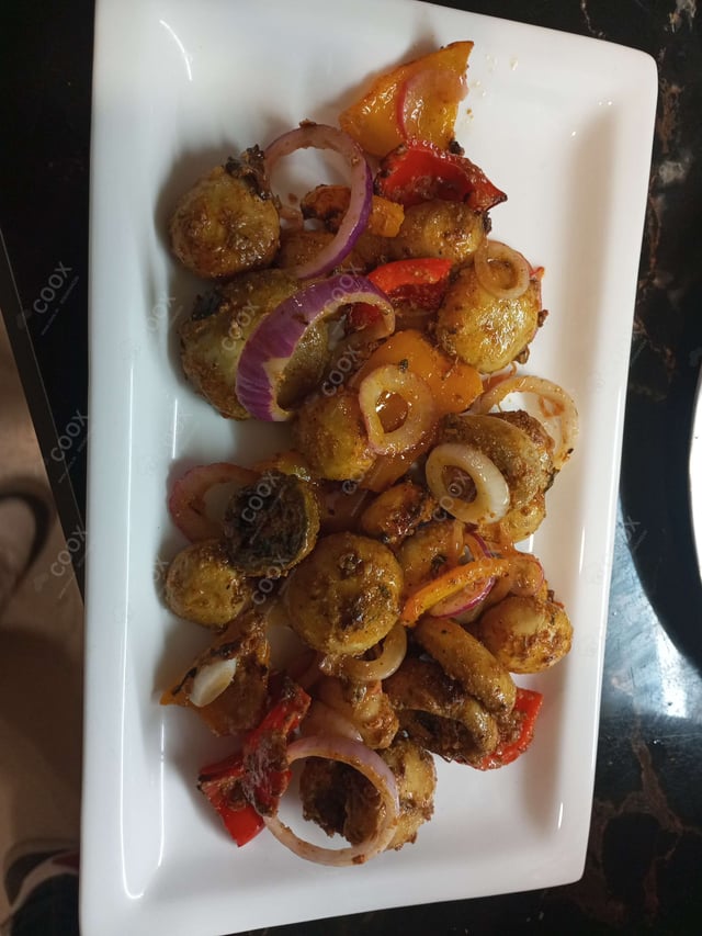 Delicious Mushroom Tikka prepared by COOX