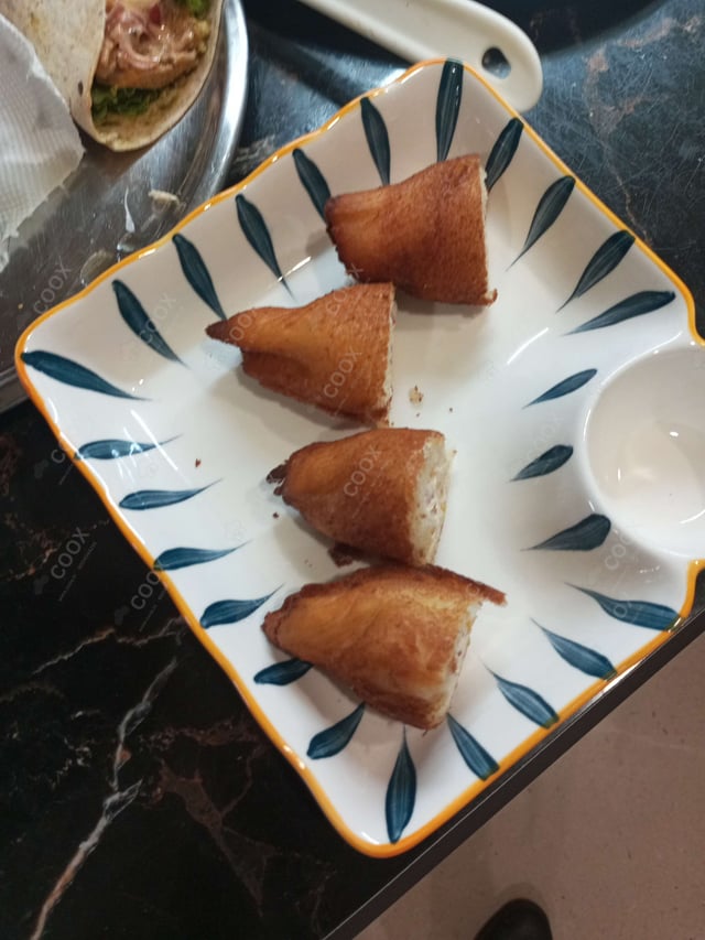 Delicious Dahi ke Sholey prepared by COOX