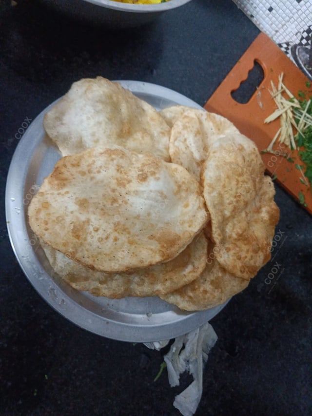 Delicious Bhature prepared by COOX