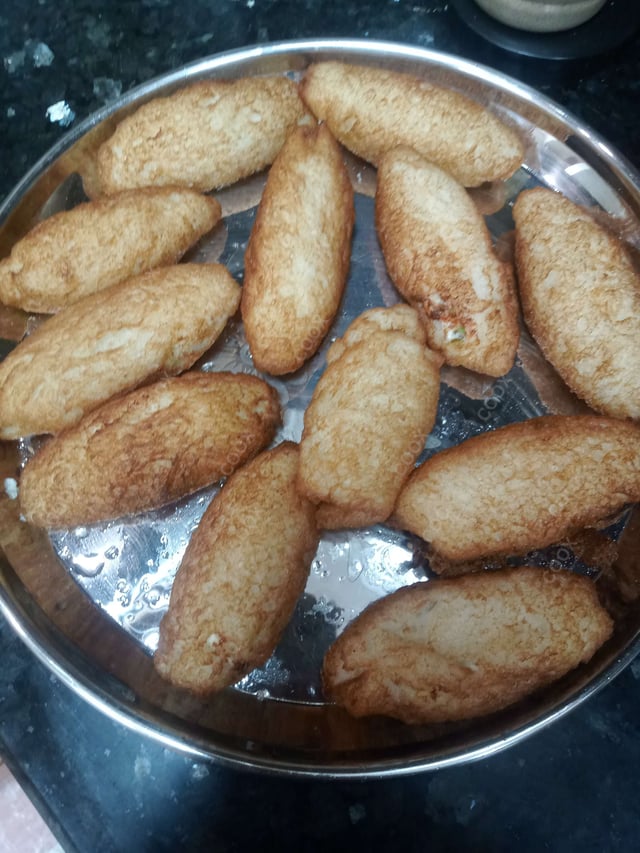 Delicious Dahi ke Sholey prepared by COOX