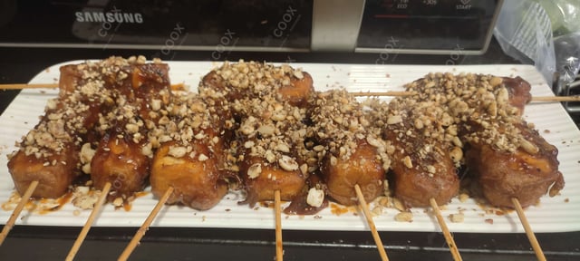 Tasty Thai Paneer Satay cooked by COOX chefs cooks during occasions parties events at home