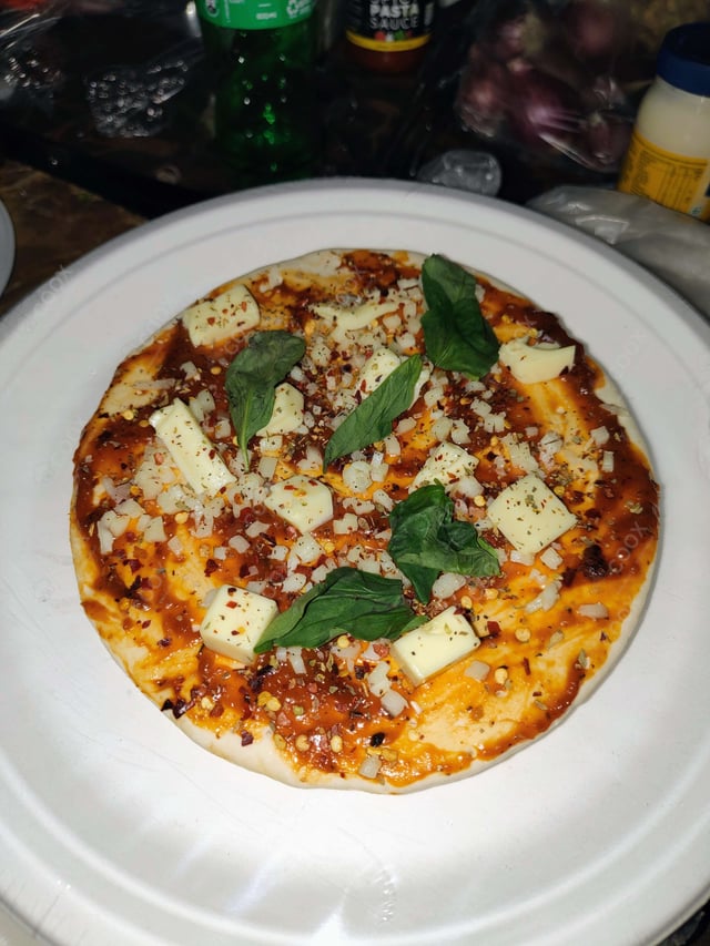 Tasty Margherita Pizza cooked by COOX chefs cooks during occasions parties events at home