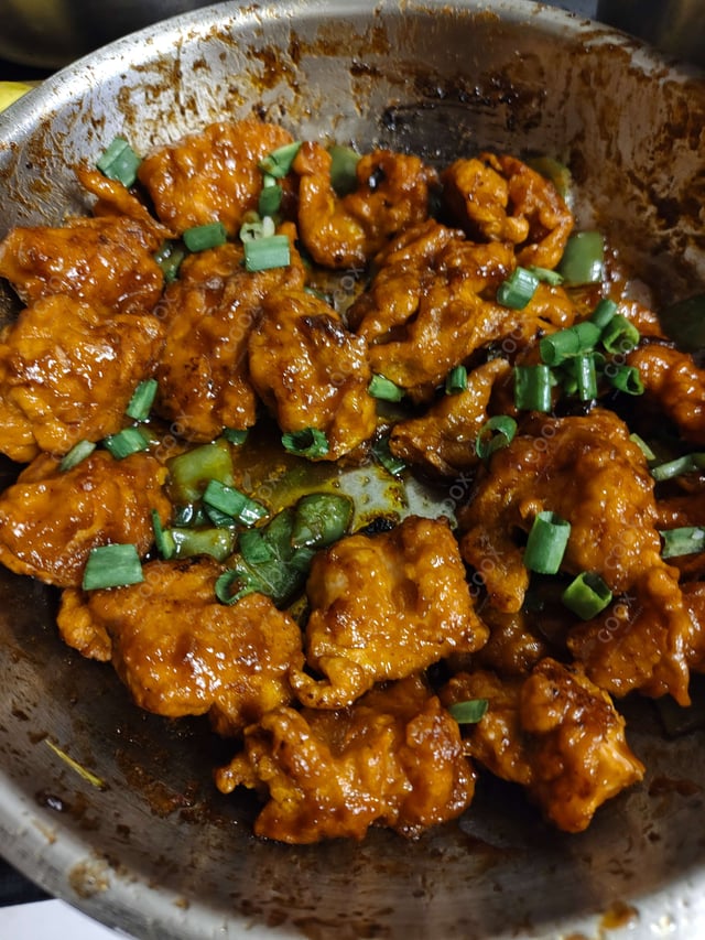 Tasty Chicken Manchurian (Dry) cooked by COOX chefs cooks during occasions parties events at home