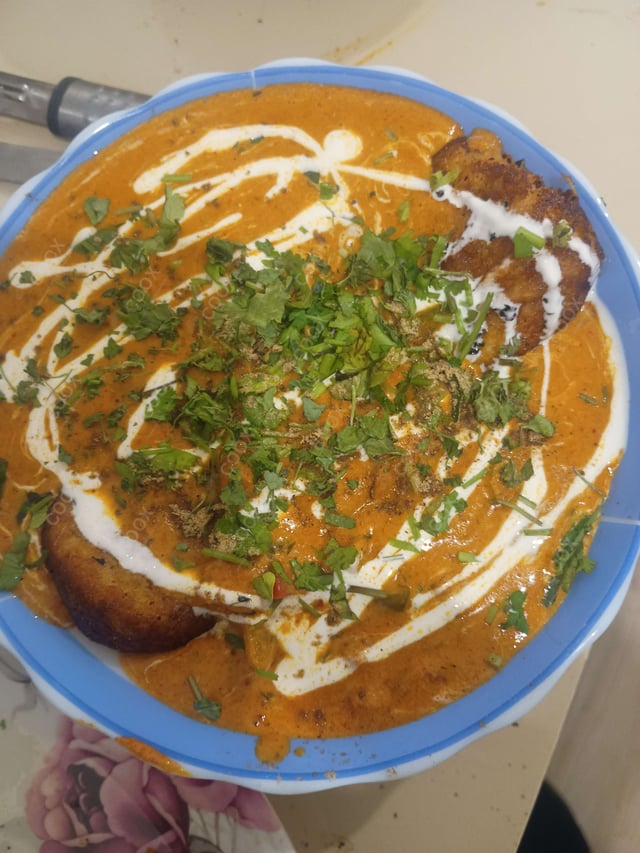 Delicious Malai Kofta (Orange Gravy) prepared by COOX