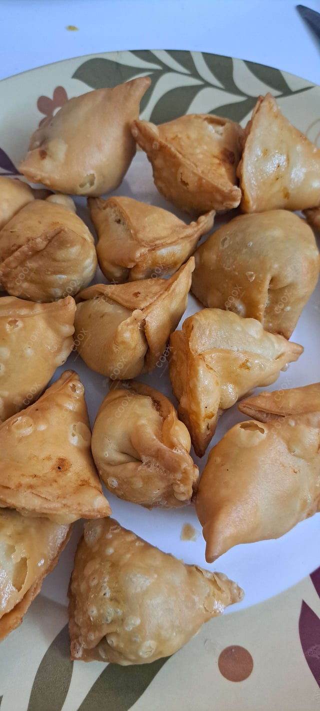 Delicious Mini Samosas prepared by COOX