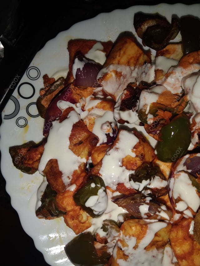Delicious Paneer Tikka prepared by COOX