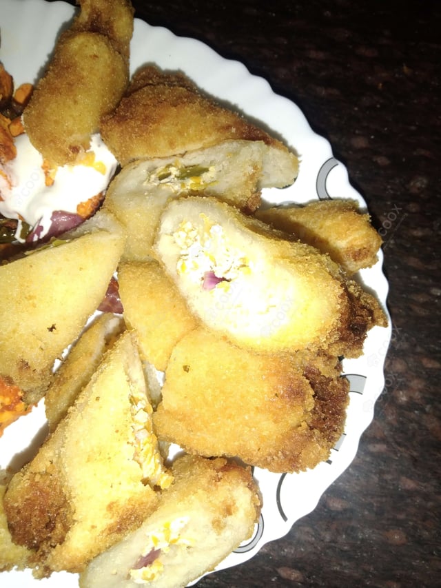 Delicious Dahi ke Sholey prepared by COOX