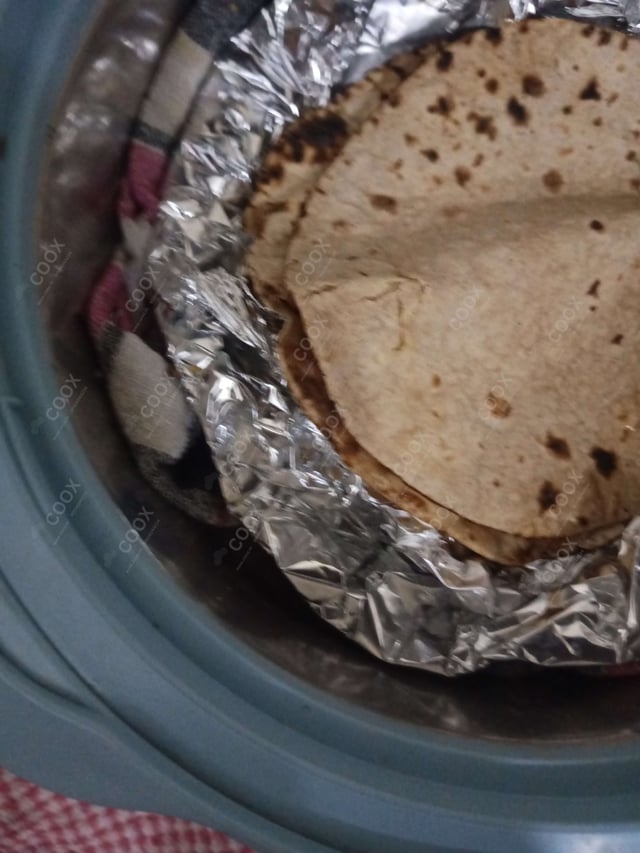 Delicious Tawa Rotis prepared by COOX