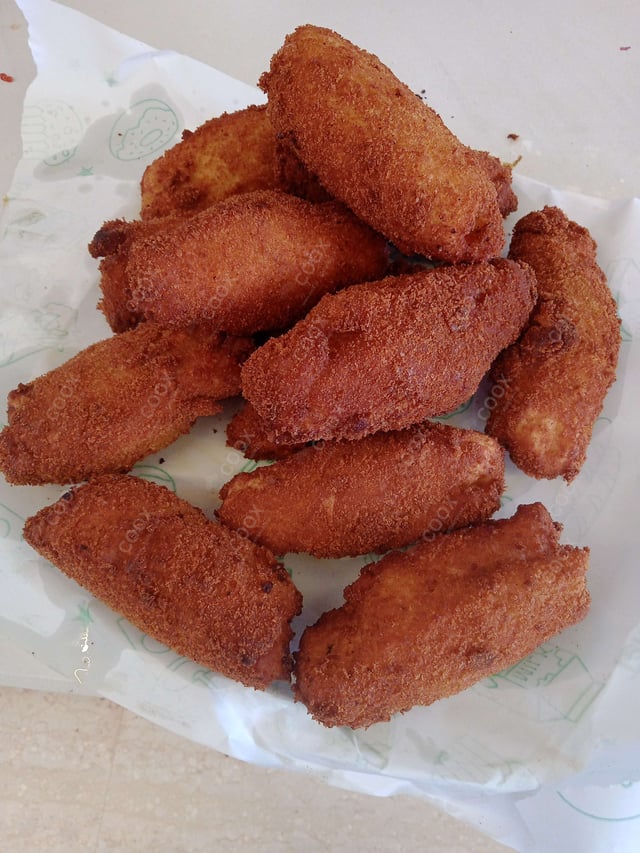 Delicious Dahi ke Sholey prepared by COOX