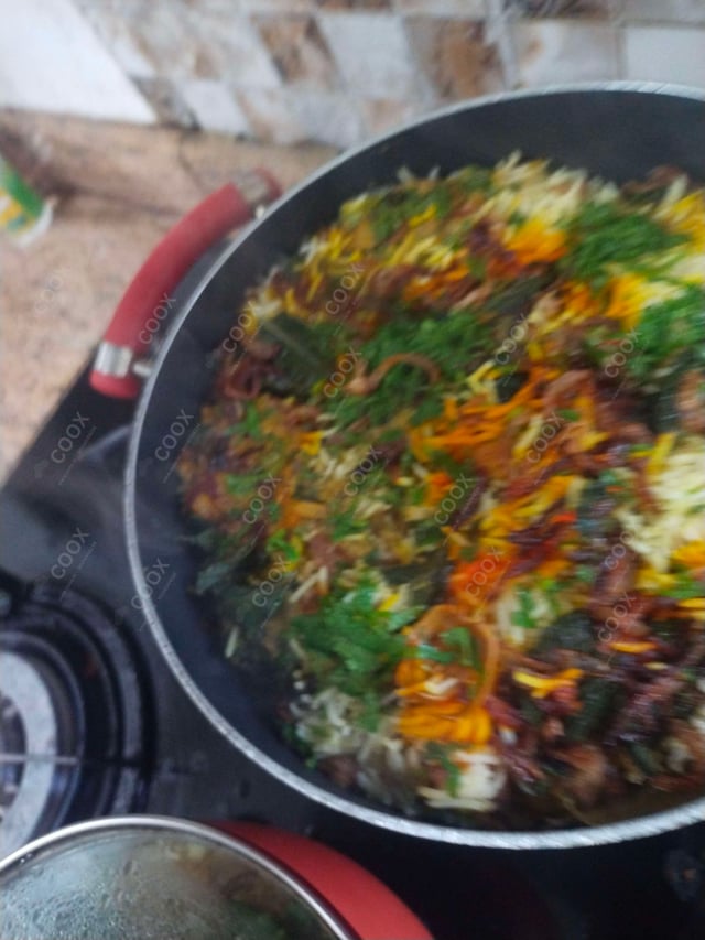 Delicious Veg Biryani prepared by COOX