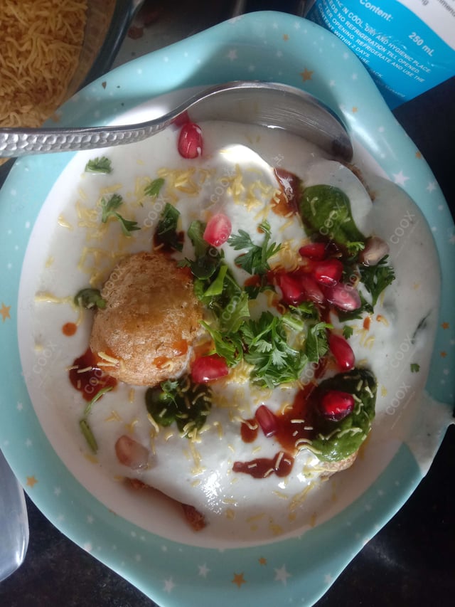 Delicious Dahi Bhalla prepared by COOX