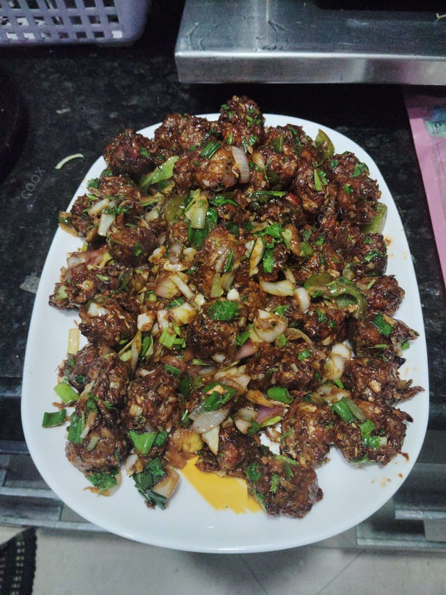 Delicious Veg Manchurian (Dry) prepared by COOX