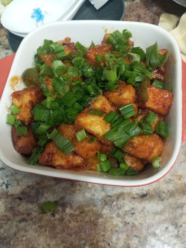 Delicious Chilli Paneer (Dry) prepared by COOX