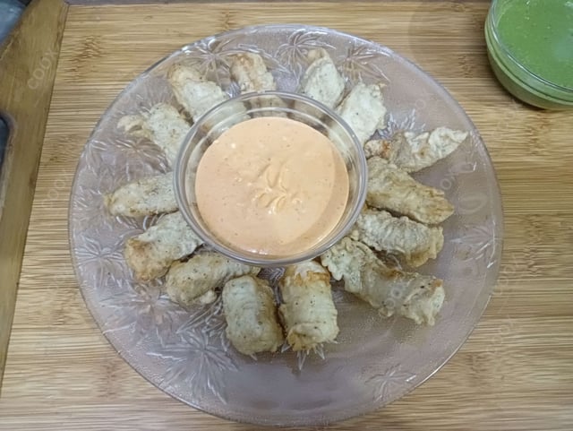 Tasty Fish Orly cooked by COOX chefs cooks during occasions parties events at home