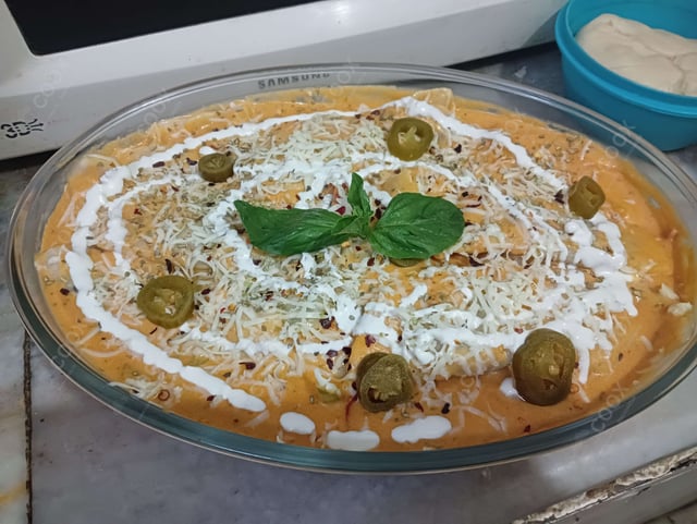 Delicious Ravioli in Pink Sauce prepared by COOX