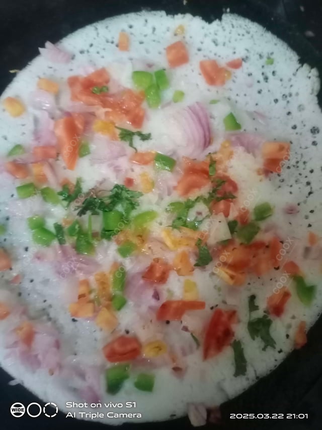 Tasty Mixed Veg Uttappam cooked by COOX chefs cooks during occasions parties events at home