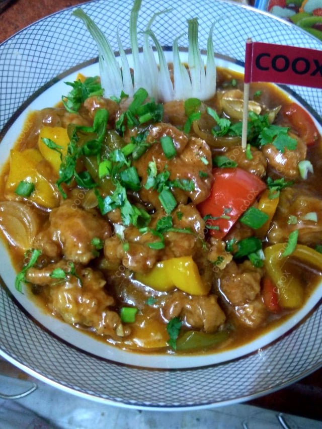 Tasty Chilli  Chicken cooked by COOX chefs cooks during occasions parties events at home