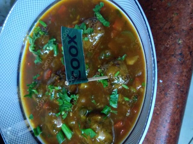 Tasty Veg Manchurian (Gravy) cooked by COOX chefs cooks during occasions parties events at home