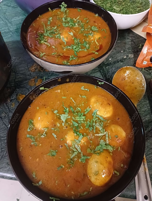 Delicious Egg Curry prepared by COOX