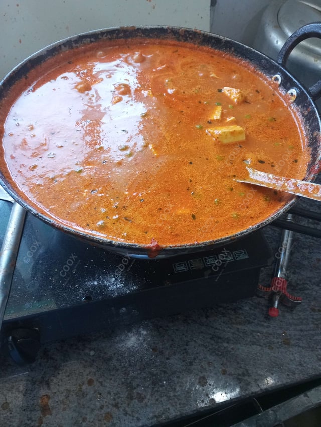 Delicious Matar Paneer prepared by COOX