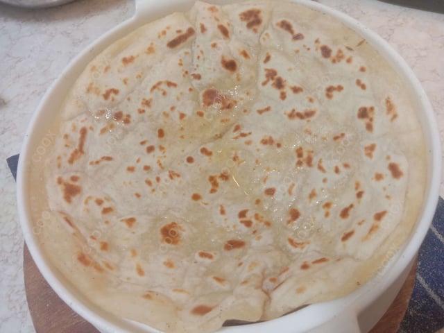 Delicious Lachha Paranthas prepared by COOX