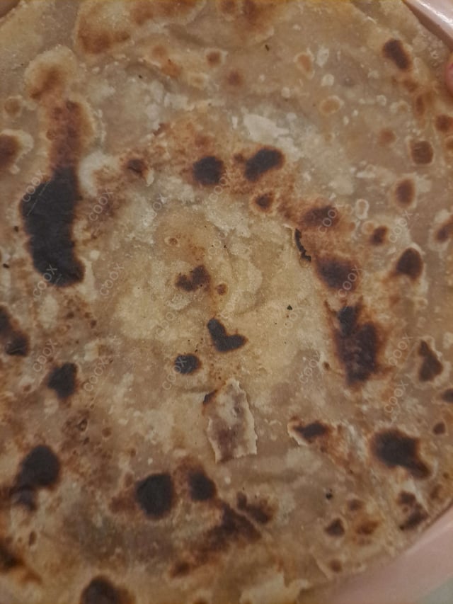 Delicious Lachha Paranthas prepared by COOX
