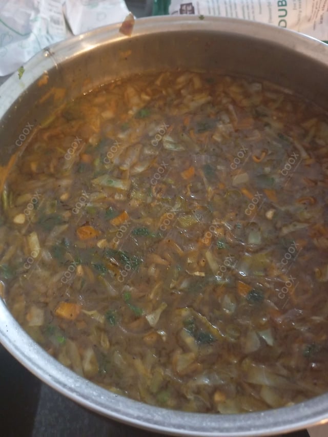 Delicious Vegetable Manchow Soup prepared by COOX