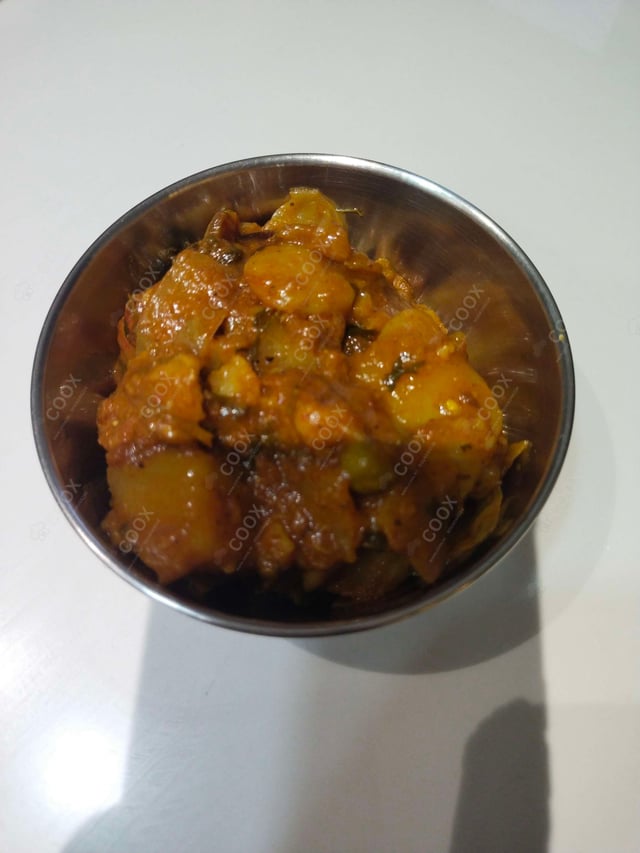 Delicious Aloo Patta Gobhi prepared by COOX