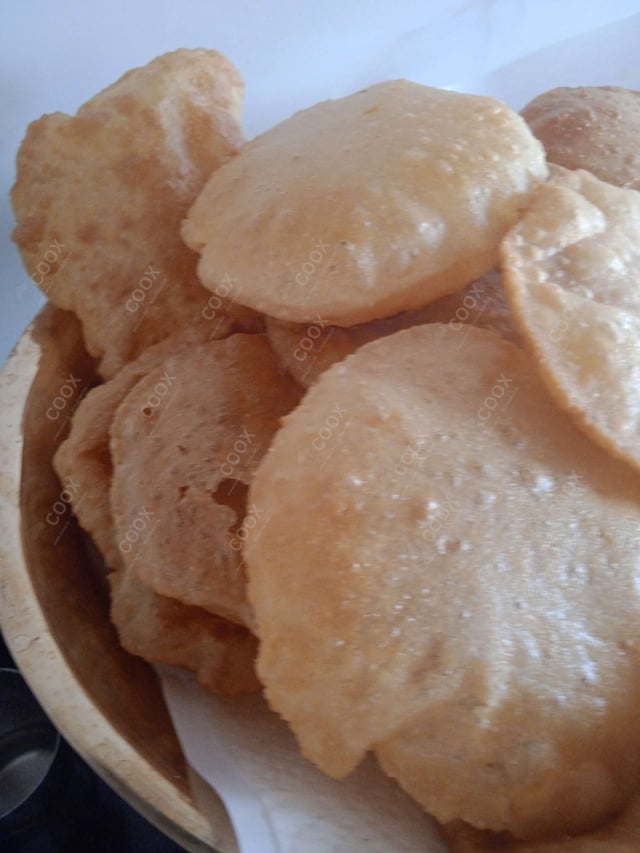 Delicious Pooris & Bedmis prepared by COOX