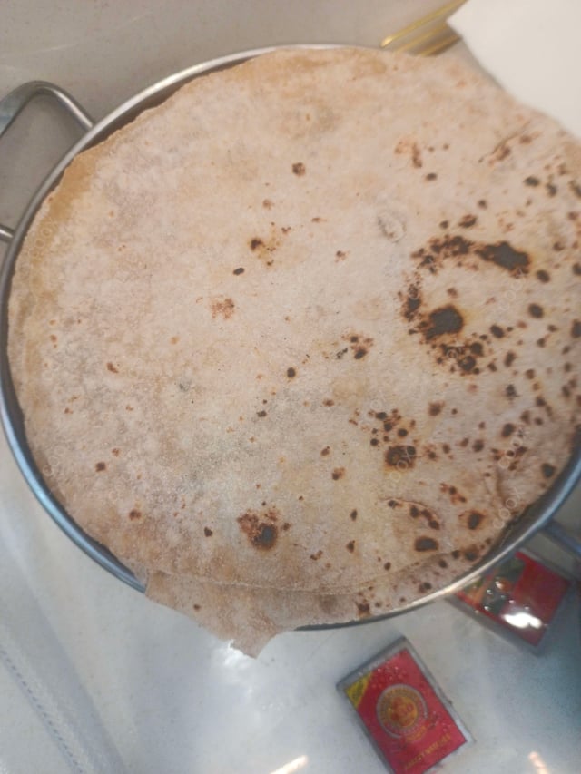 Delicious Tawa Rotis prepared by COOX