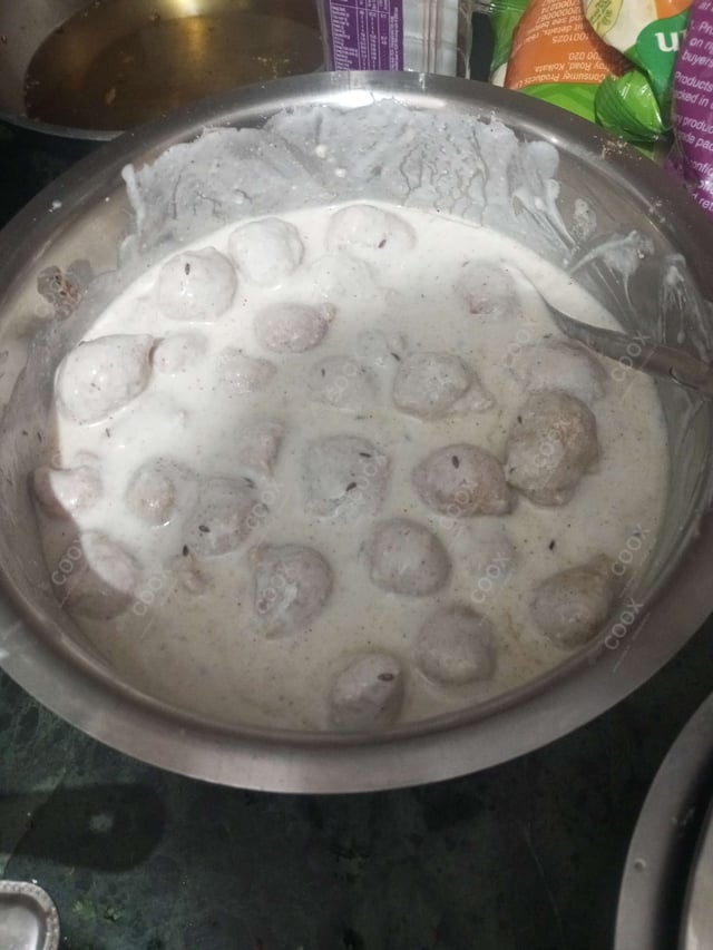 Tasty Dahi Vada cooked by COOX chefs cooks during occasions parties events at home