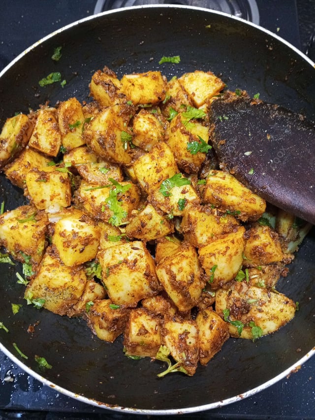 Delicious Jeera Aloo prepared by COOX