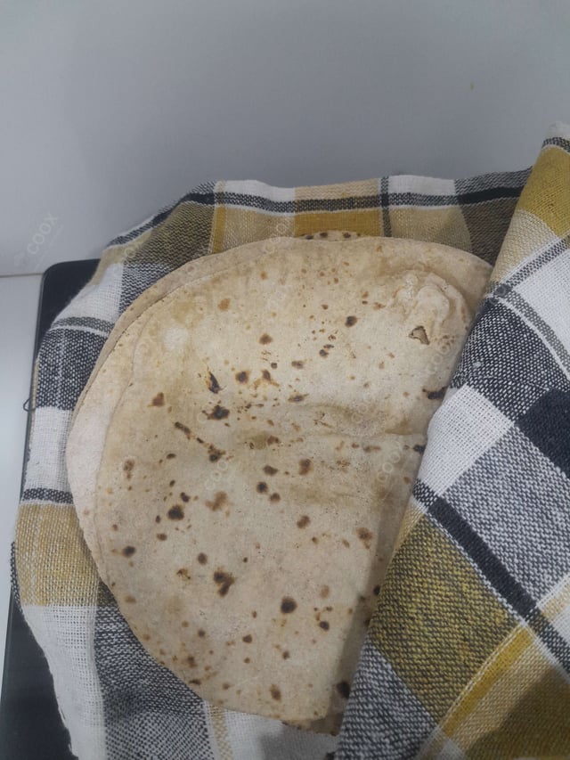 Delicious Tawa Rotis prepared by COOX