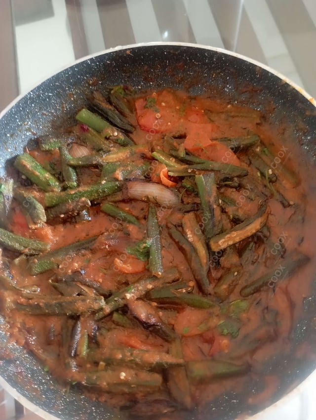 Tasty Bhindi do Pyaza cooked by COOX chefs cooks during occasions parties events at home