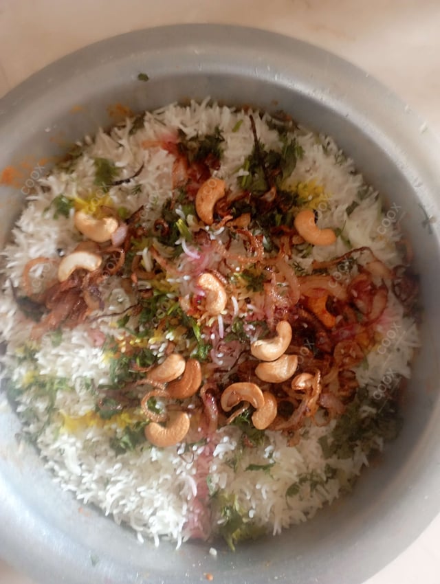 Delicious Veg Biryani prepared by COOX
