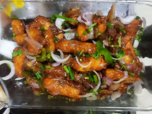 Delicious Chilli Paneer (Dry) prepared by COOX