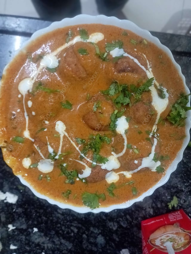 Delicious Malai Kofta (Orange Gravy) prepared by COOX