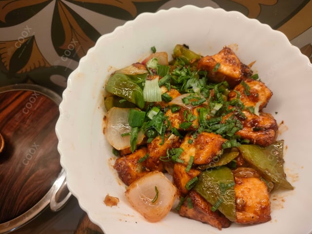 Delicious Chilli Paneer (Dry) prepared by COOX